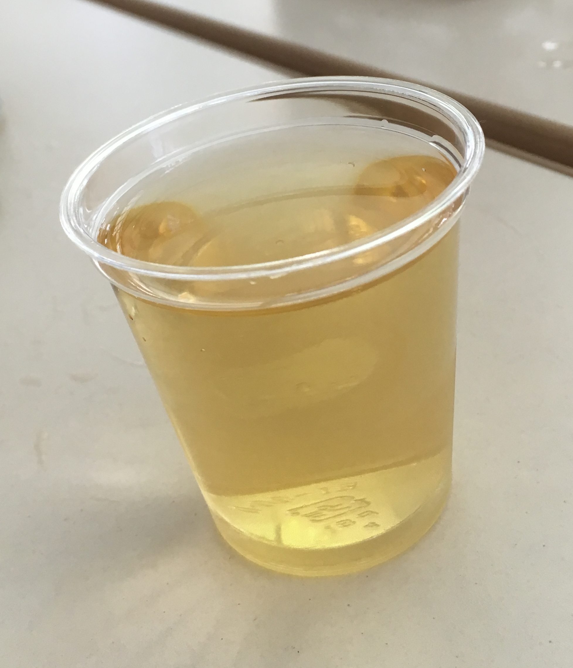 small cup of asahi highball at the Asahi beer suita factory