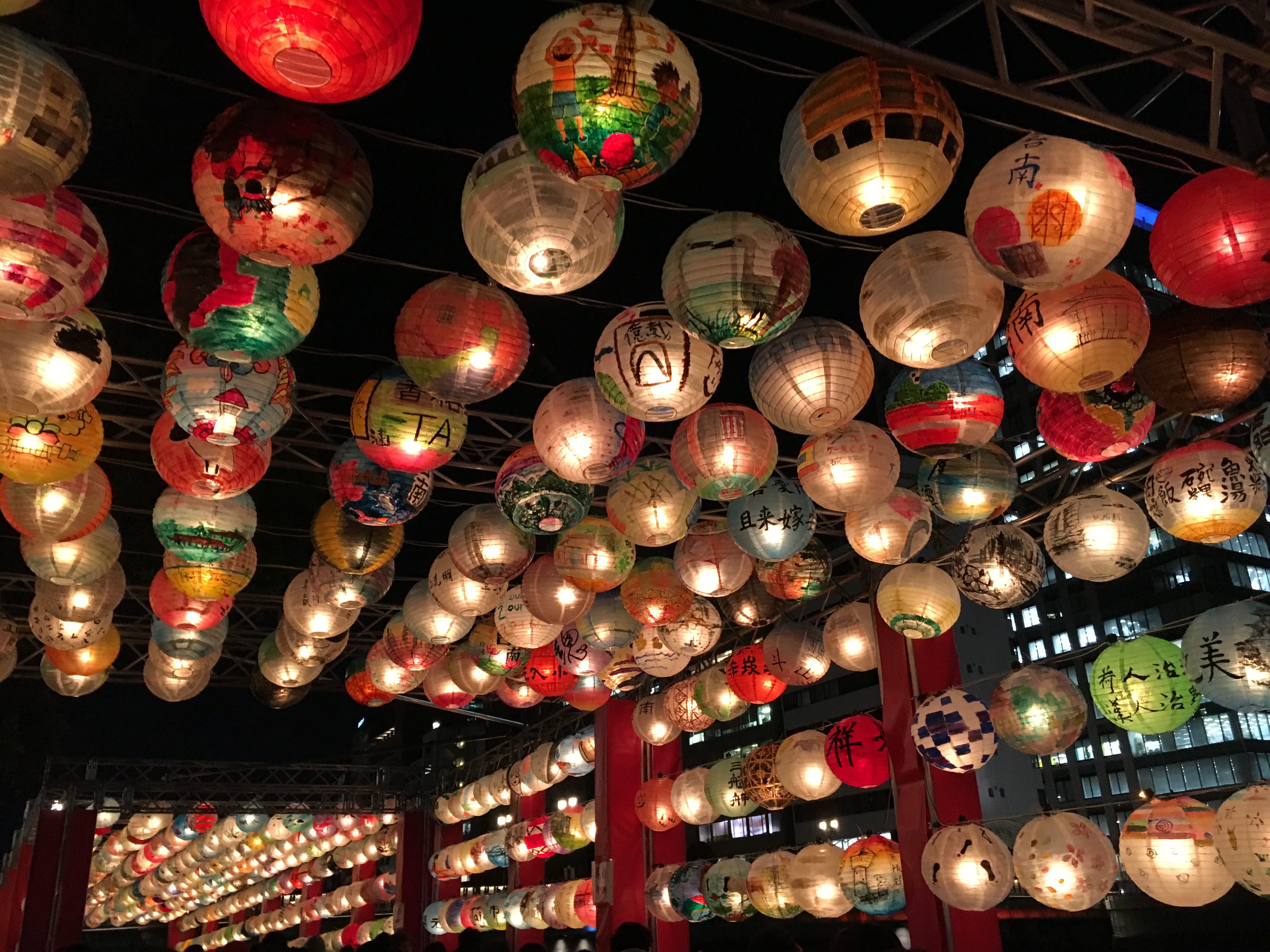 tunnel of colorful glowing lanterns