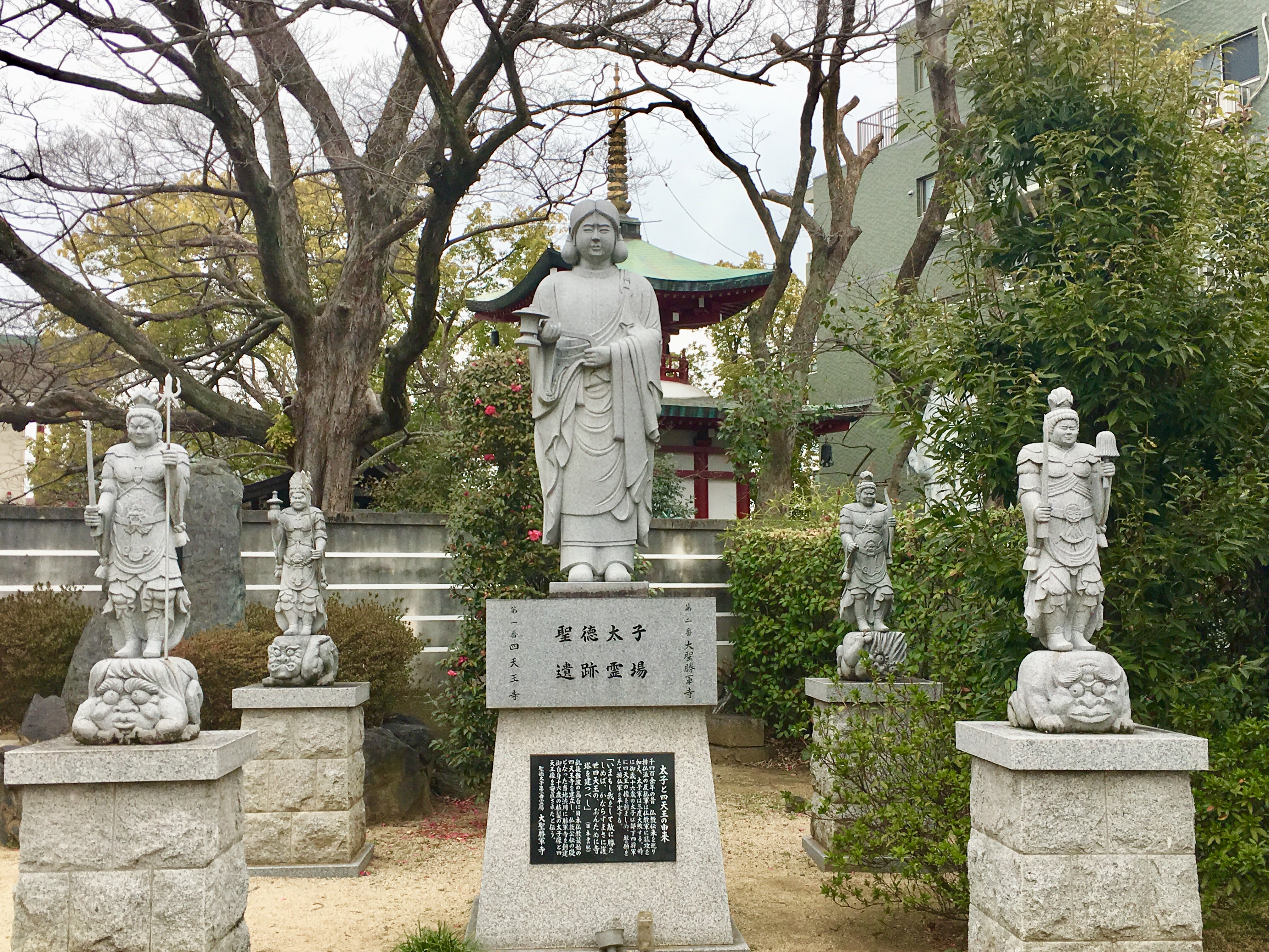stone statue of prince Shotoku and the shiten-no gods with shotoku in the center
