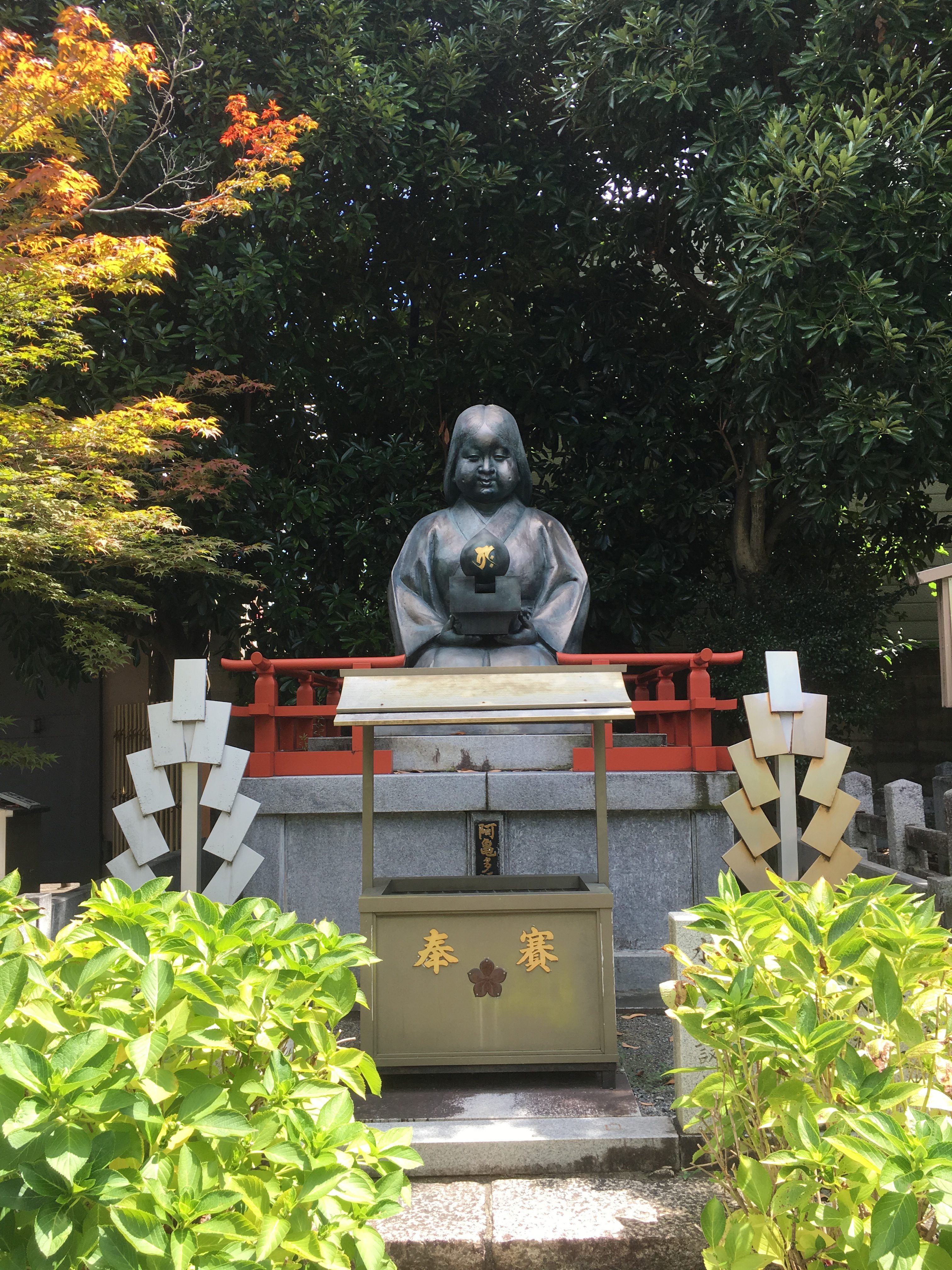 Statue of Okamesan at Senbon Shakado