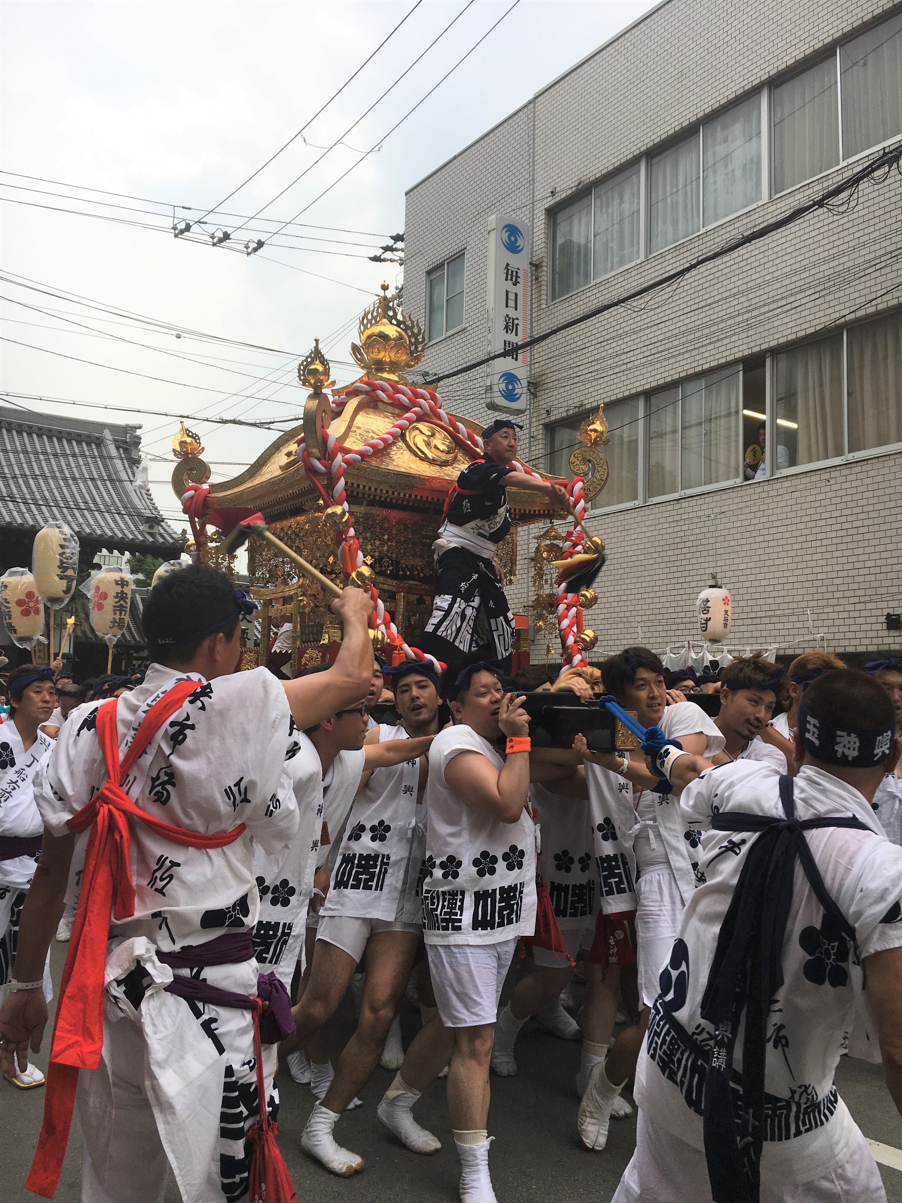 large mikoshi parade at tenjin matsuri
