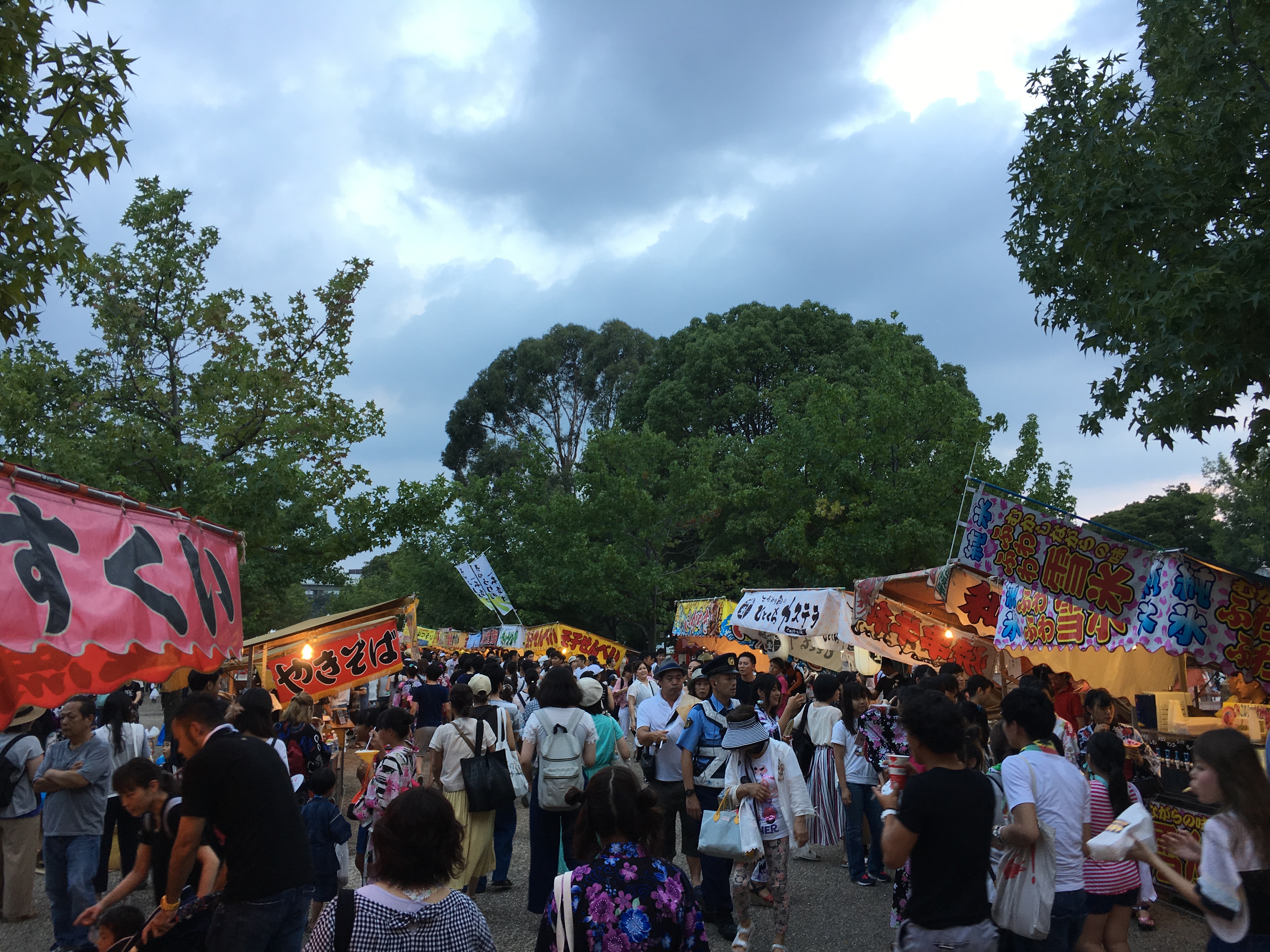 crowds at Japanese festivals and many colorful food stalls