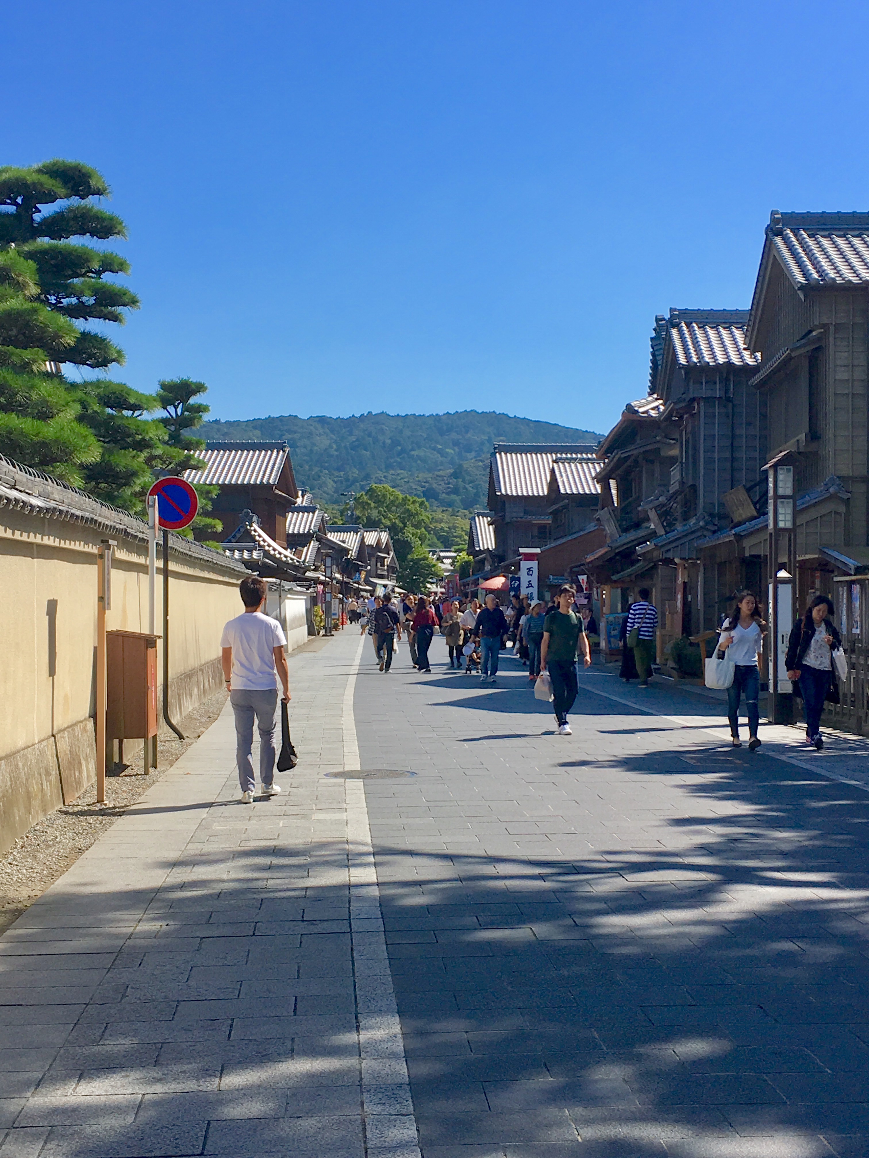 Busy shopping street near Ise Jingu's Naiku with many tourists walking