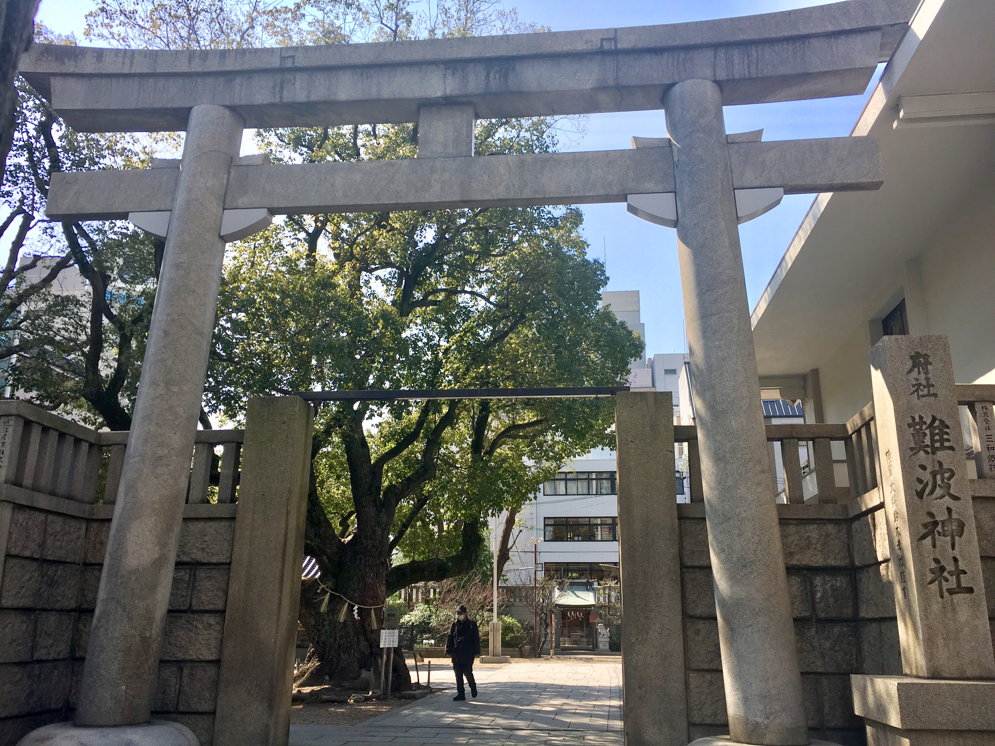 large stone torii of one of Midosuji's shrines