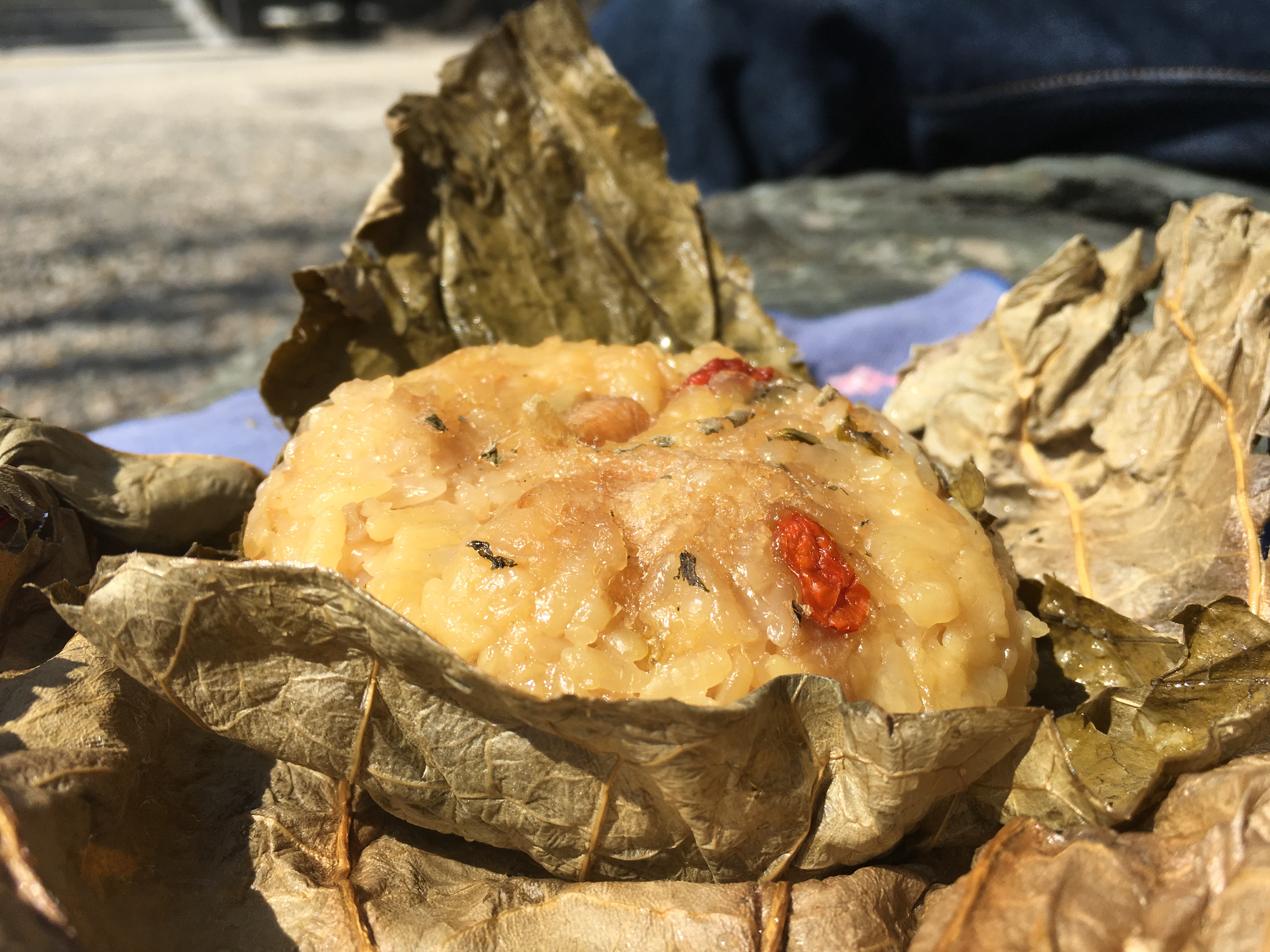 stamed ball of hasu gohan wrapped in lotus leaves