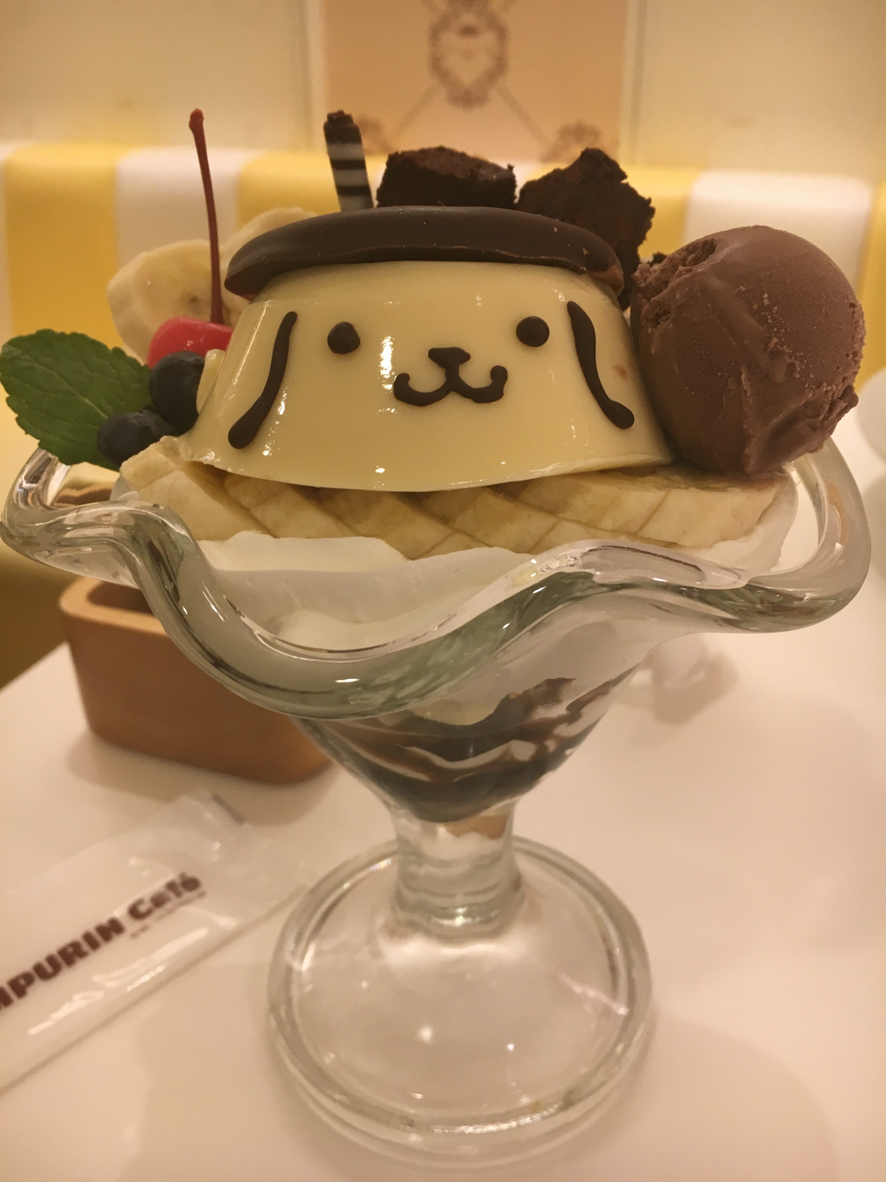 chocolate banana and pudding parfait featuring pompompurin