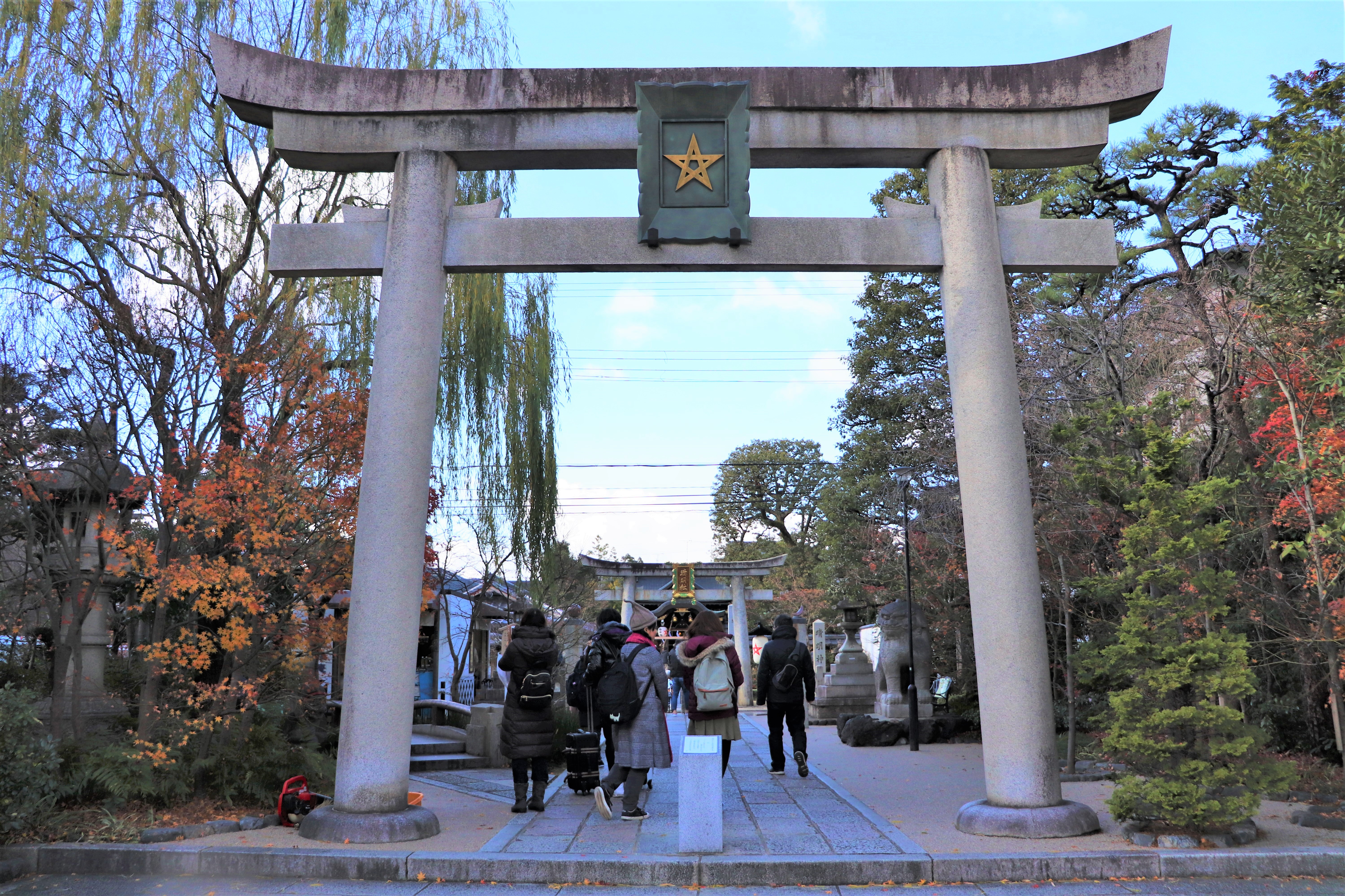 stone torii bearing the mark the Abe no Seimei at the entrance of Abe no Seimei shrine