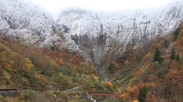 Shomyo waterfall and the mountains covered with snow